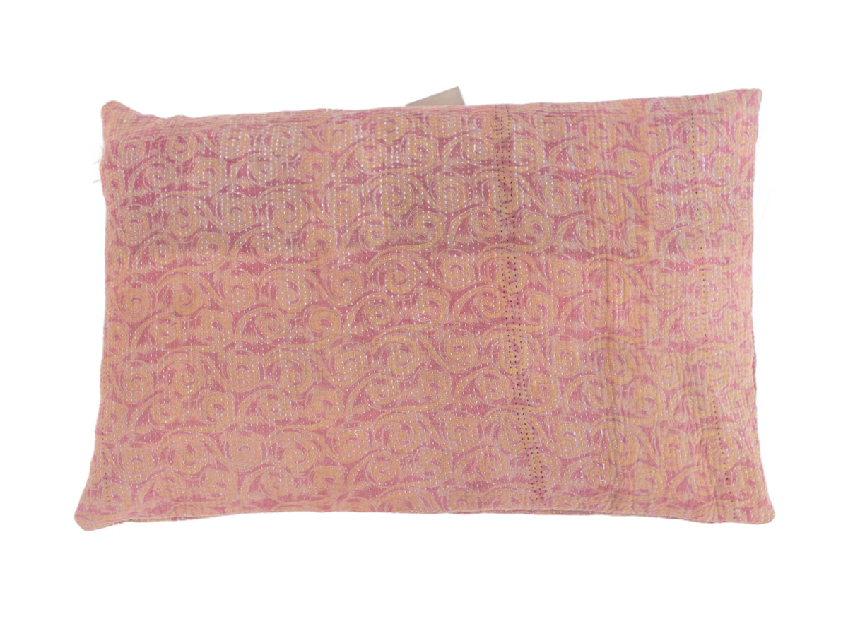 Sari pillowcase 60x40 in blue turquoise checkered/horizontal striped pattern with beige and cream gray background on sofa.