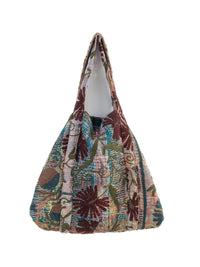Boho hobo-skuldertaske med blomsterprint i blågrøn, pink og bordeaux med et løstsiddende, blødt stofdesign