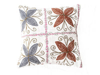 Unique suzani pillowcase 50x50 cm in white cotton with oriental butterfly motifs in rust orange blue gray and fine windings and pink border